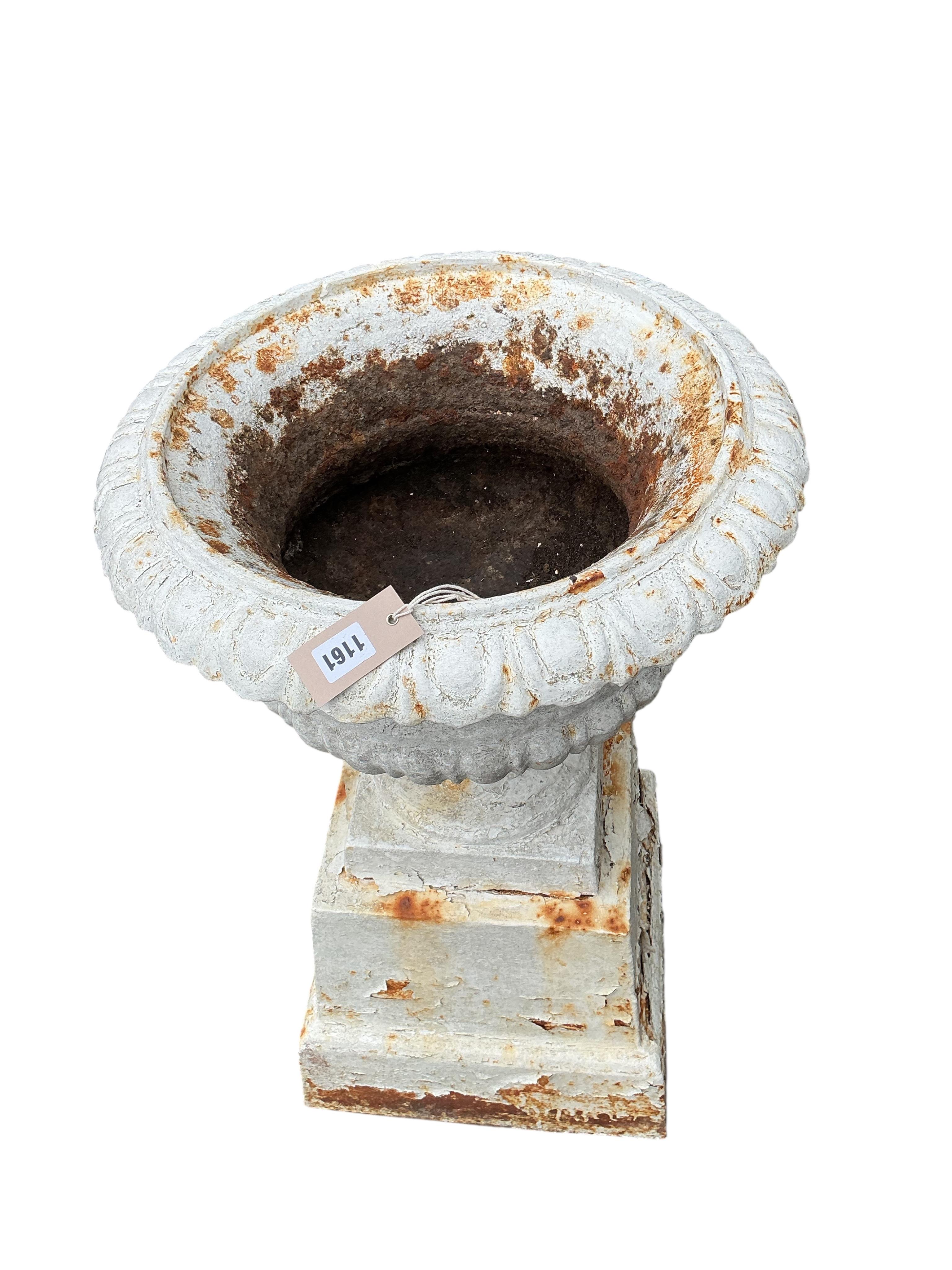 A pair of Victorian painted cast iron campana urns on square bases, diameter 48cm, height 80cm